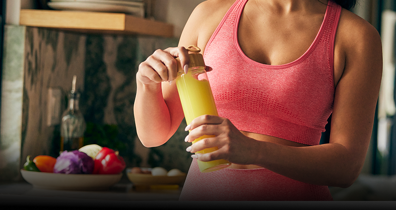 woman mixing a supplement drink
